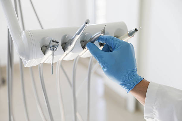 Professional Tooth Extraction technician working in New Haven, MI